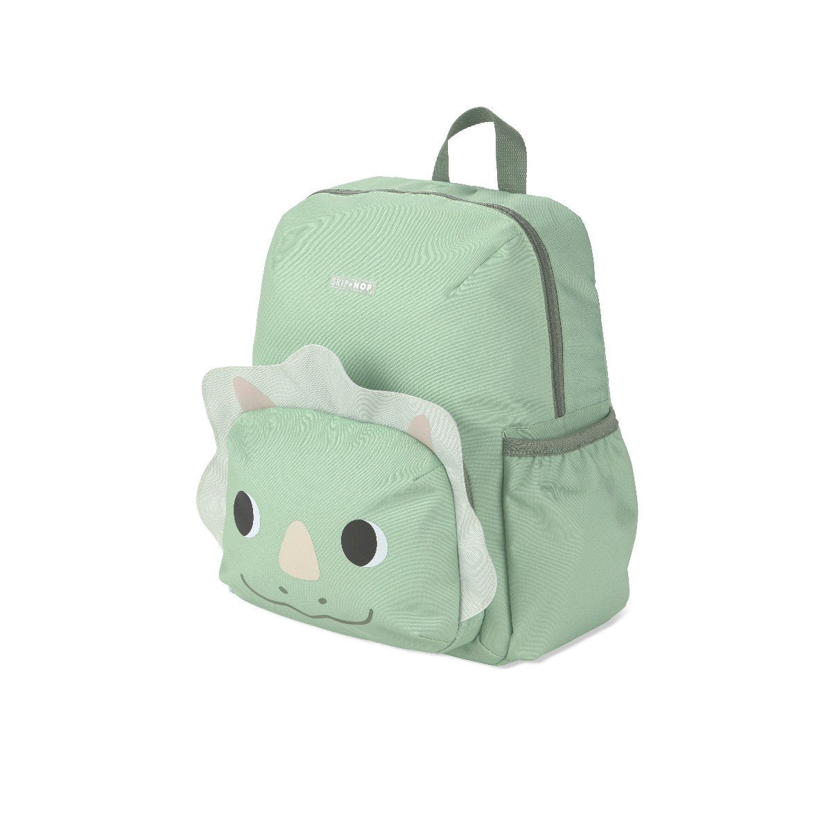 Angled side view of the Skip Hop Besties Squad dino kids backpack showing the side bottle pocket, top carry handle and zip closure