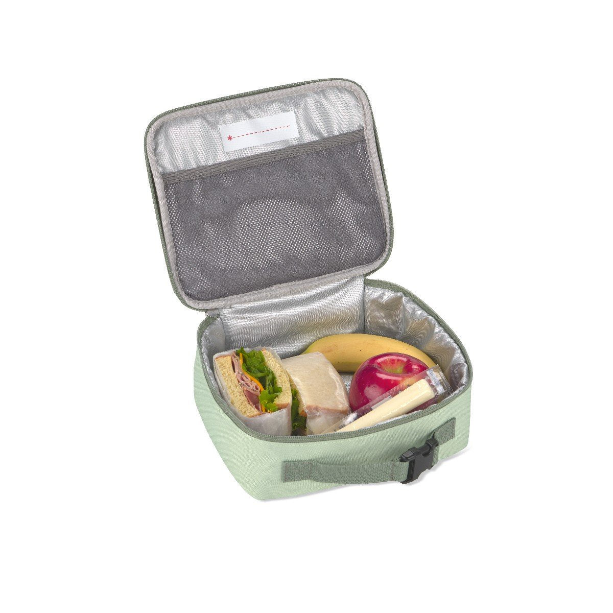 Skip Hop dino insulated lunch bag packed with a sandwich, apple, banana and cheese to show its roomy capacity